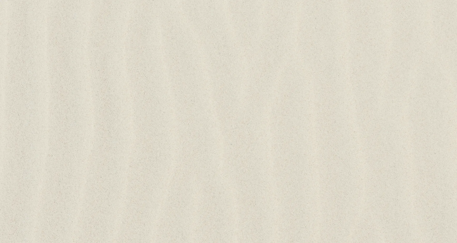 Smooth light beige sand texture with subtle wave patterns.