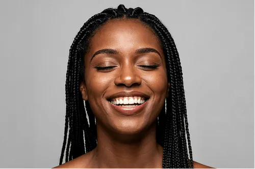 A women happily closing her eyes