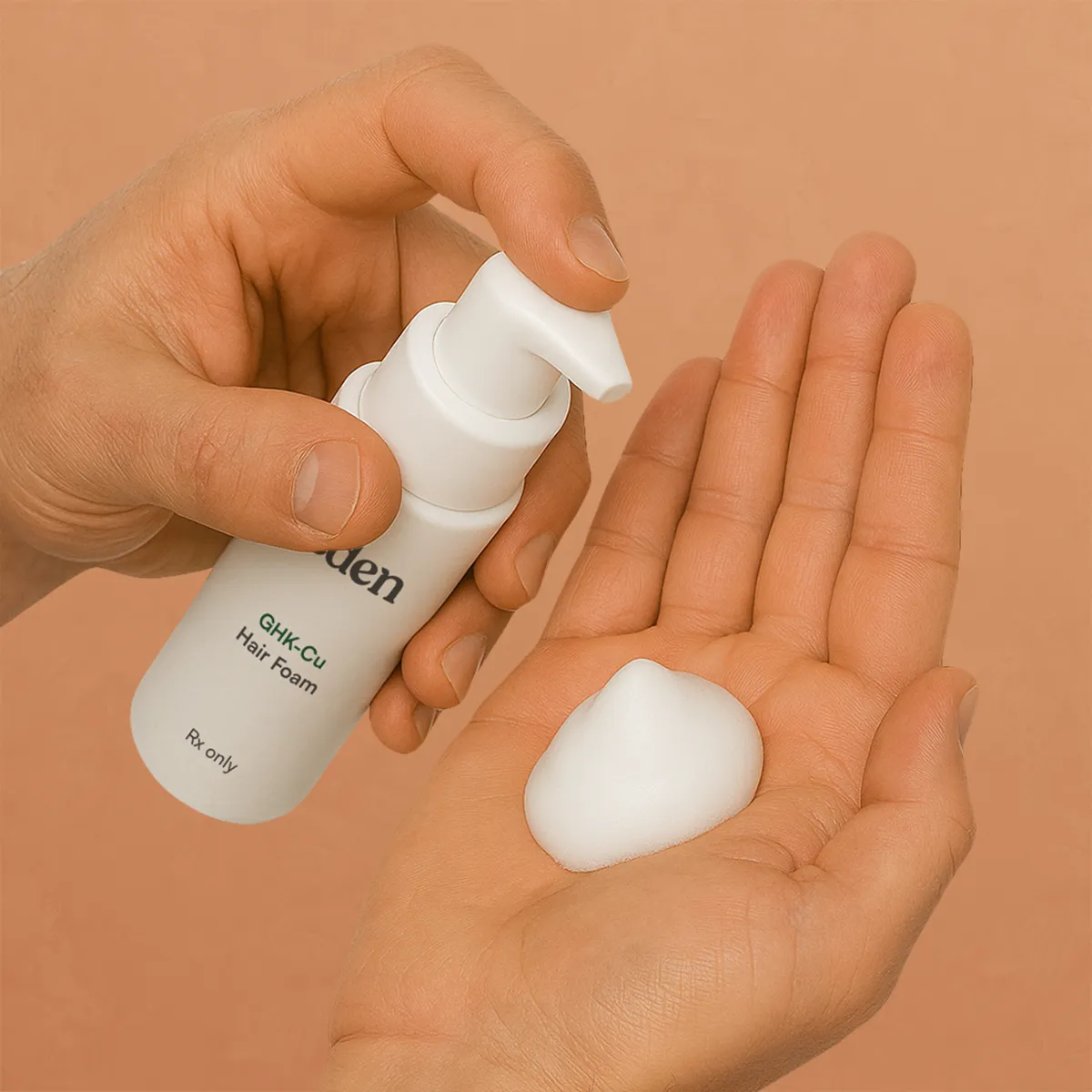GHK-Cu hair foam being dispensed for an article about female pattern hair loss treatment options.