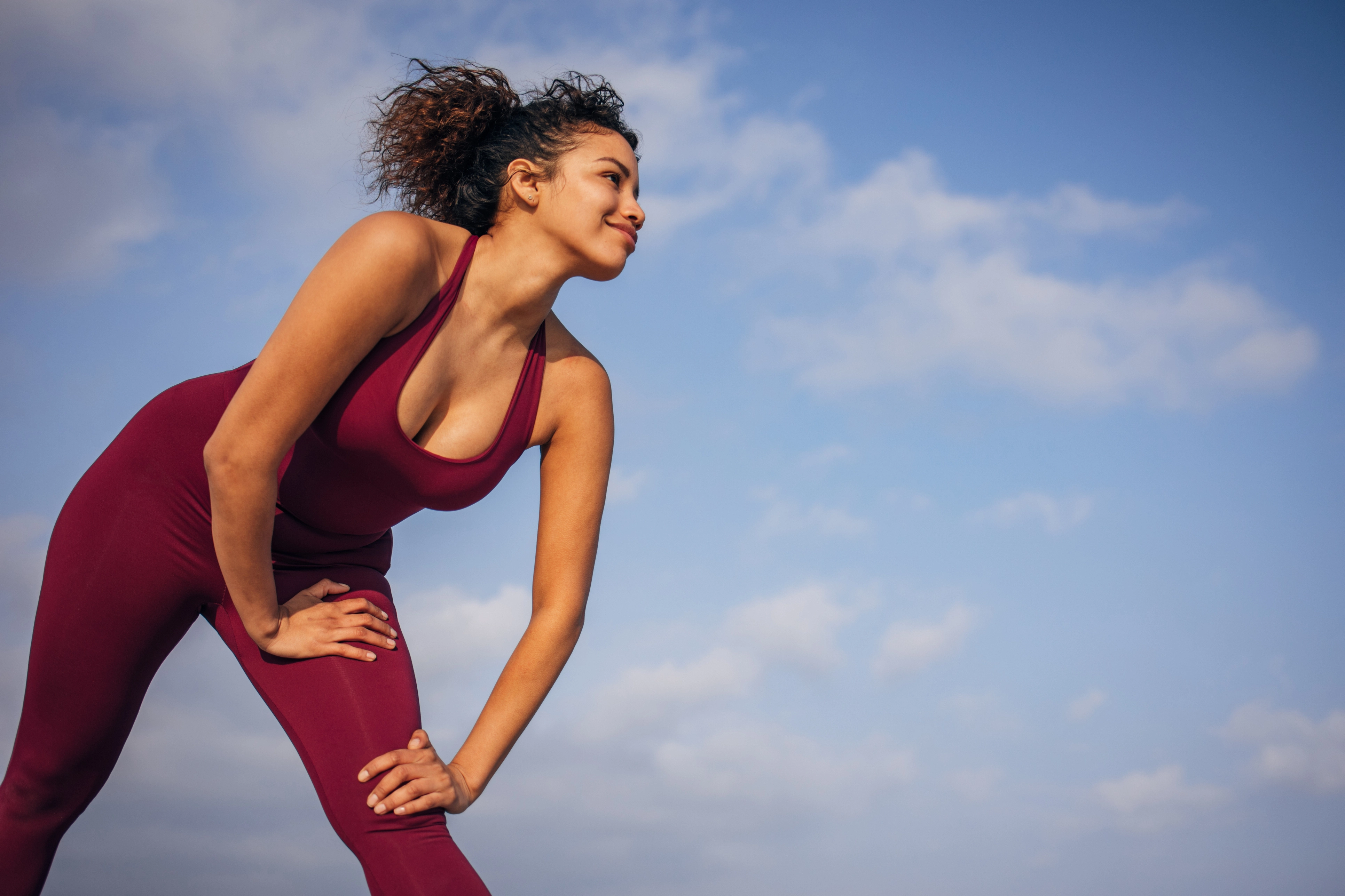 Adult resting after exercise for an article about low IGF-1 symptoms, fatigue, and slower recovery.