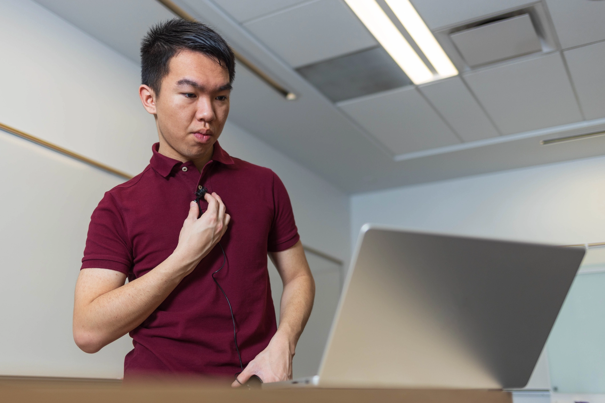 Person preparing for a presentation for an article about propranolol and performance anxiety.