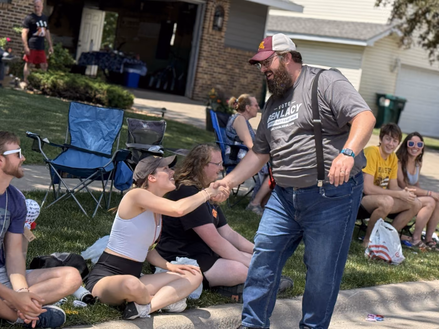 Ben greeting parade watchers on a summer afternoon
