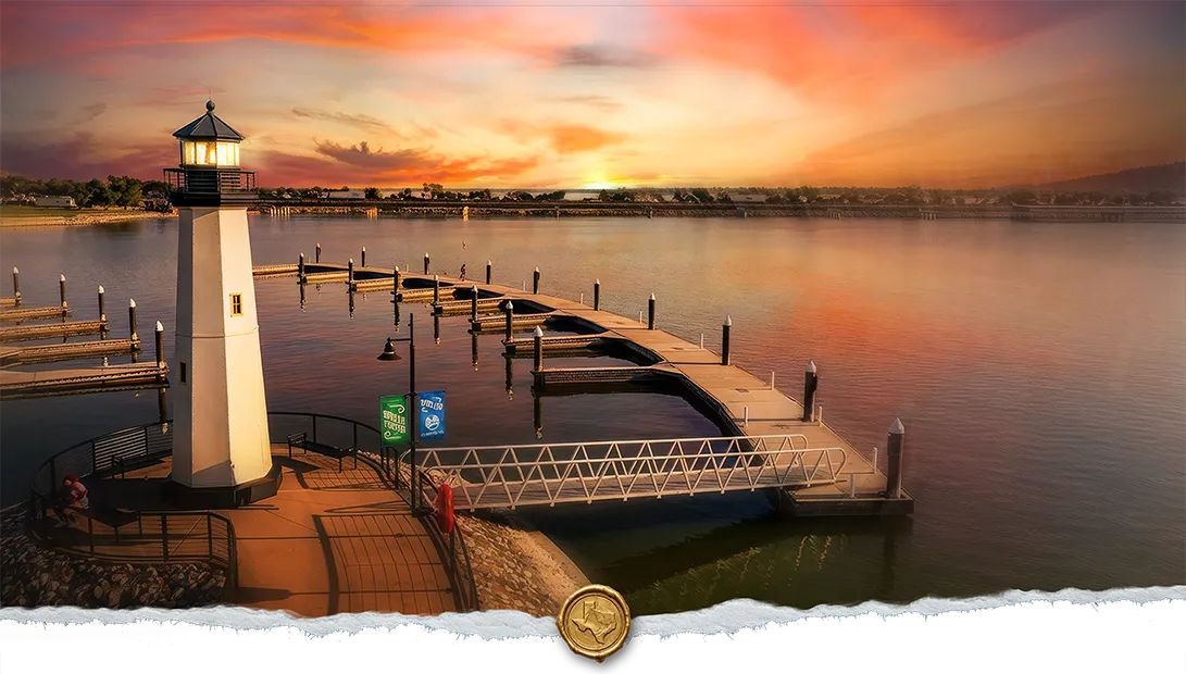 Lighthouse at The Harbor Rockwall on Lake Ray Hubbard at sunset