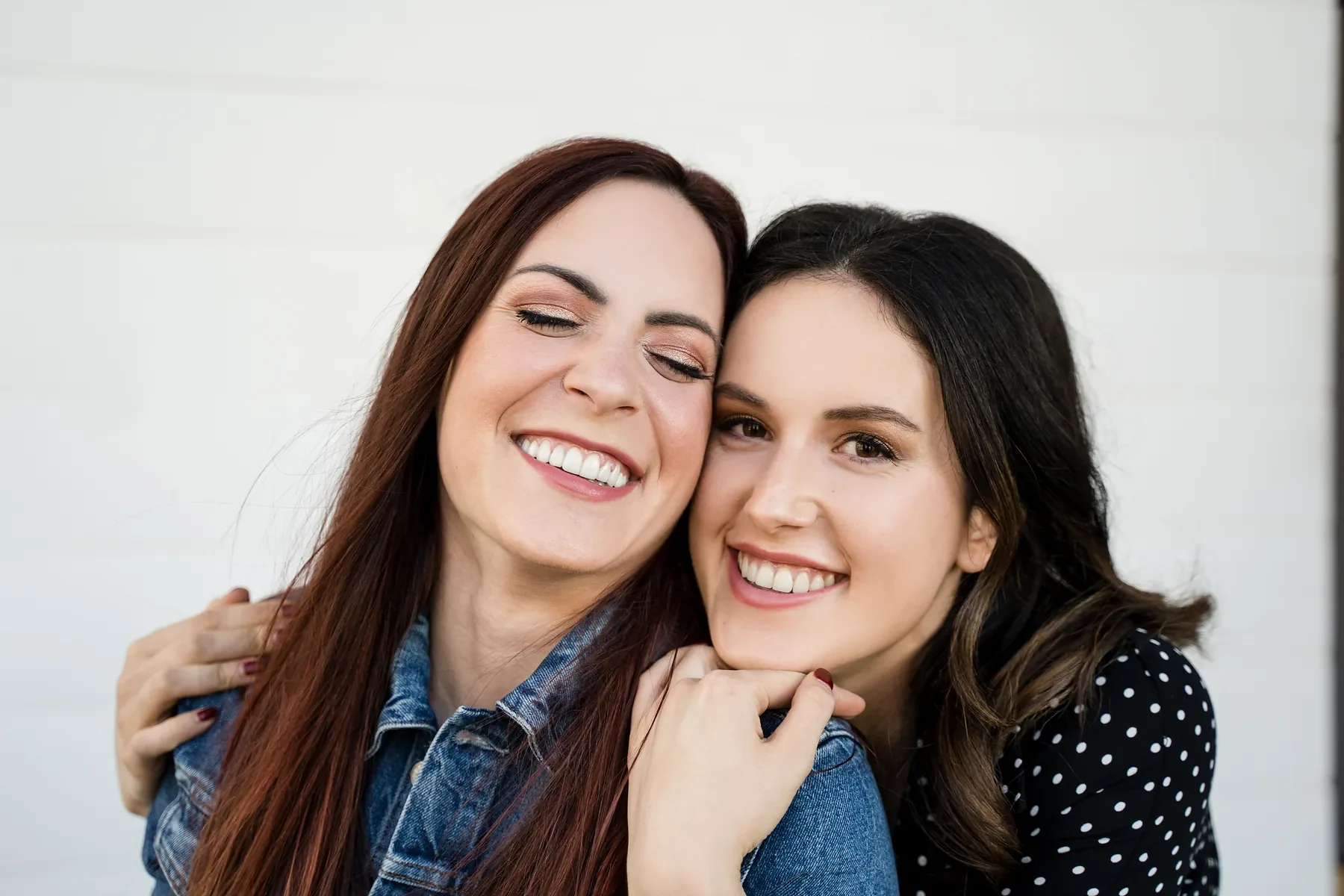 Two women smiling together