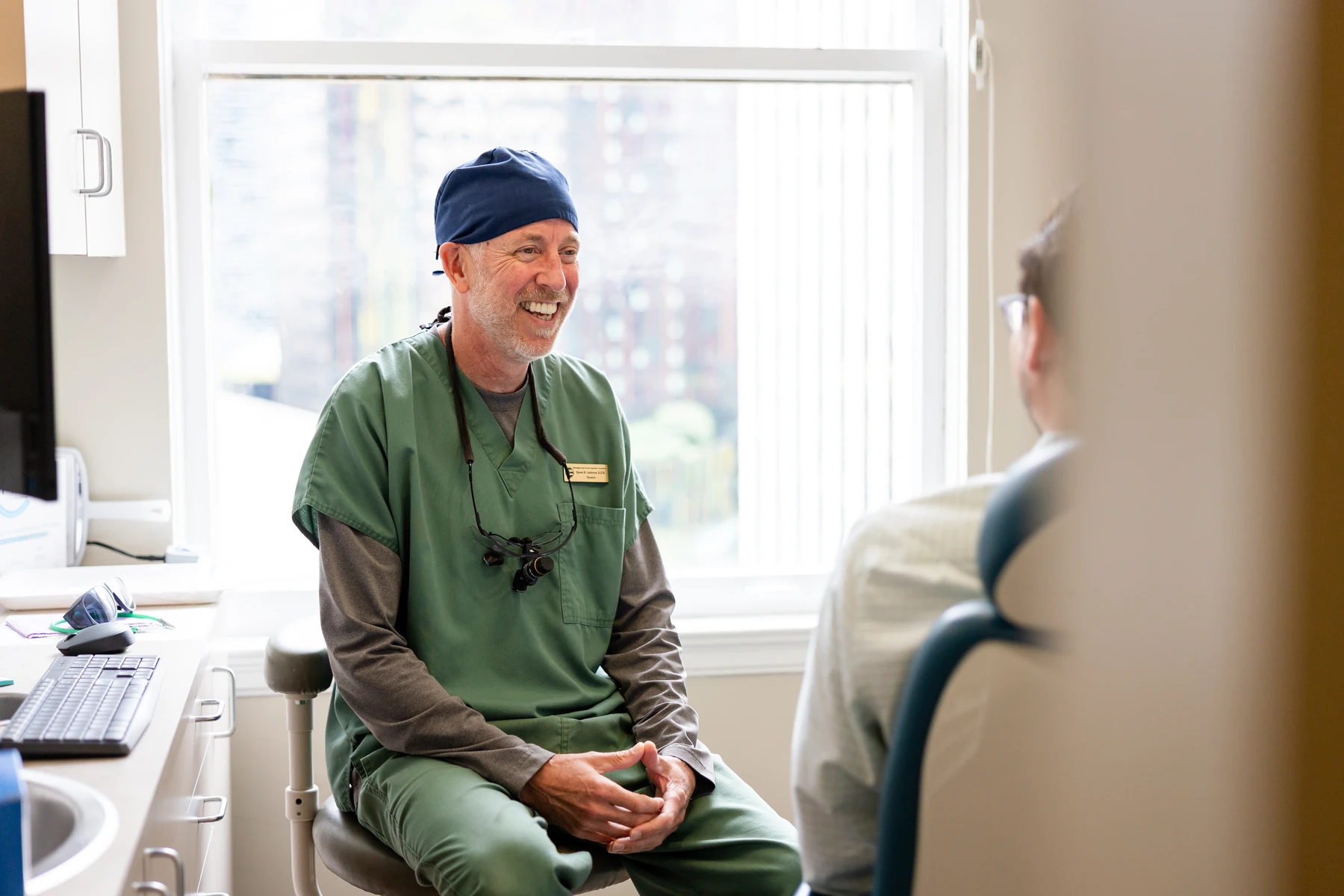 Dentist talking through options with a patient at Downtown Seattle Dentists