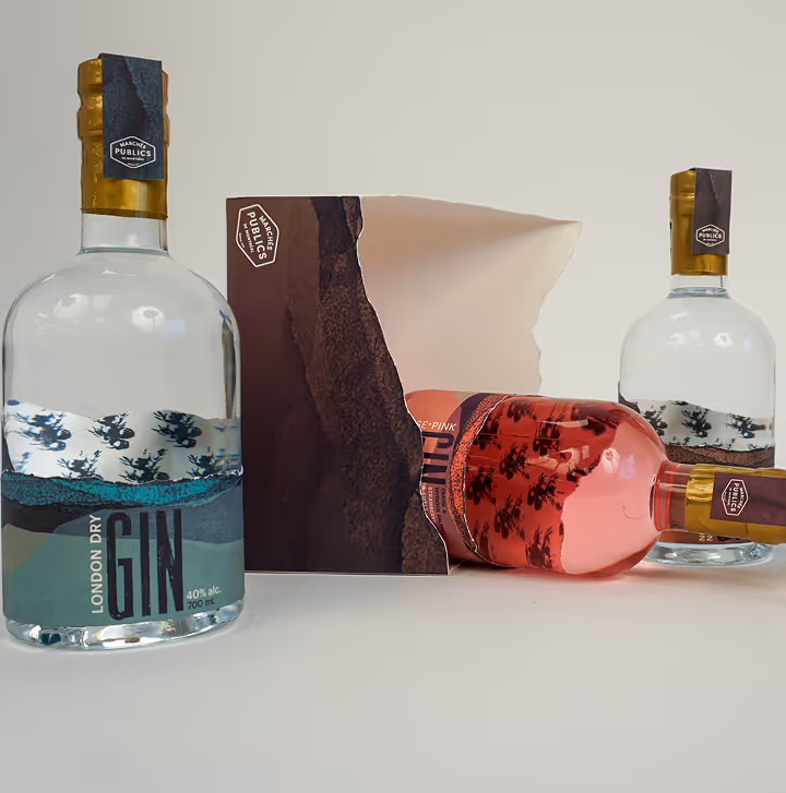 Two clear gin bottles and one pink gin bottle with a torn box on a plain background.