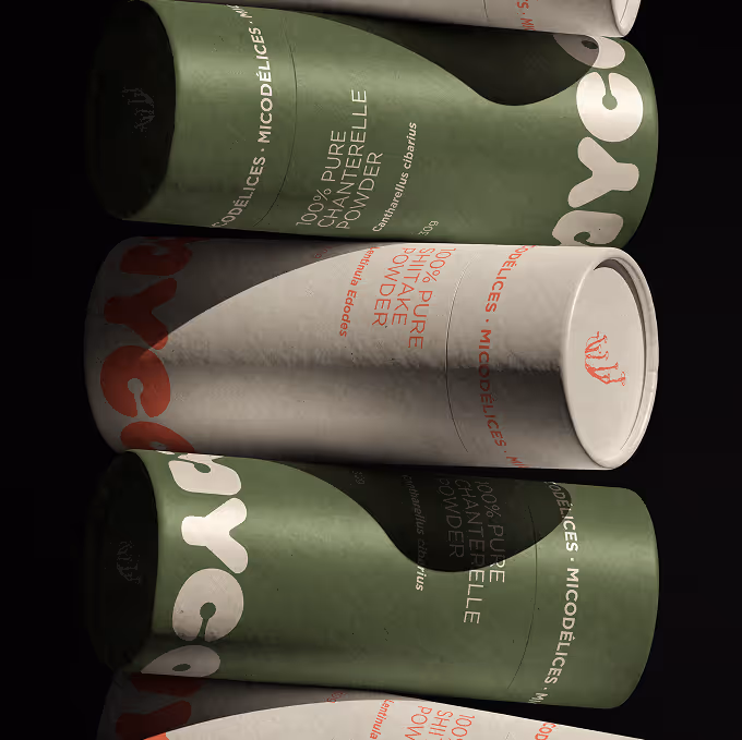 Stack of cylindrical packages labeled 100% pure chanterelle and shiitake mushroom powder. (creatoom.com)