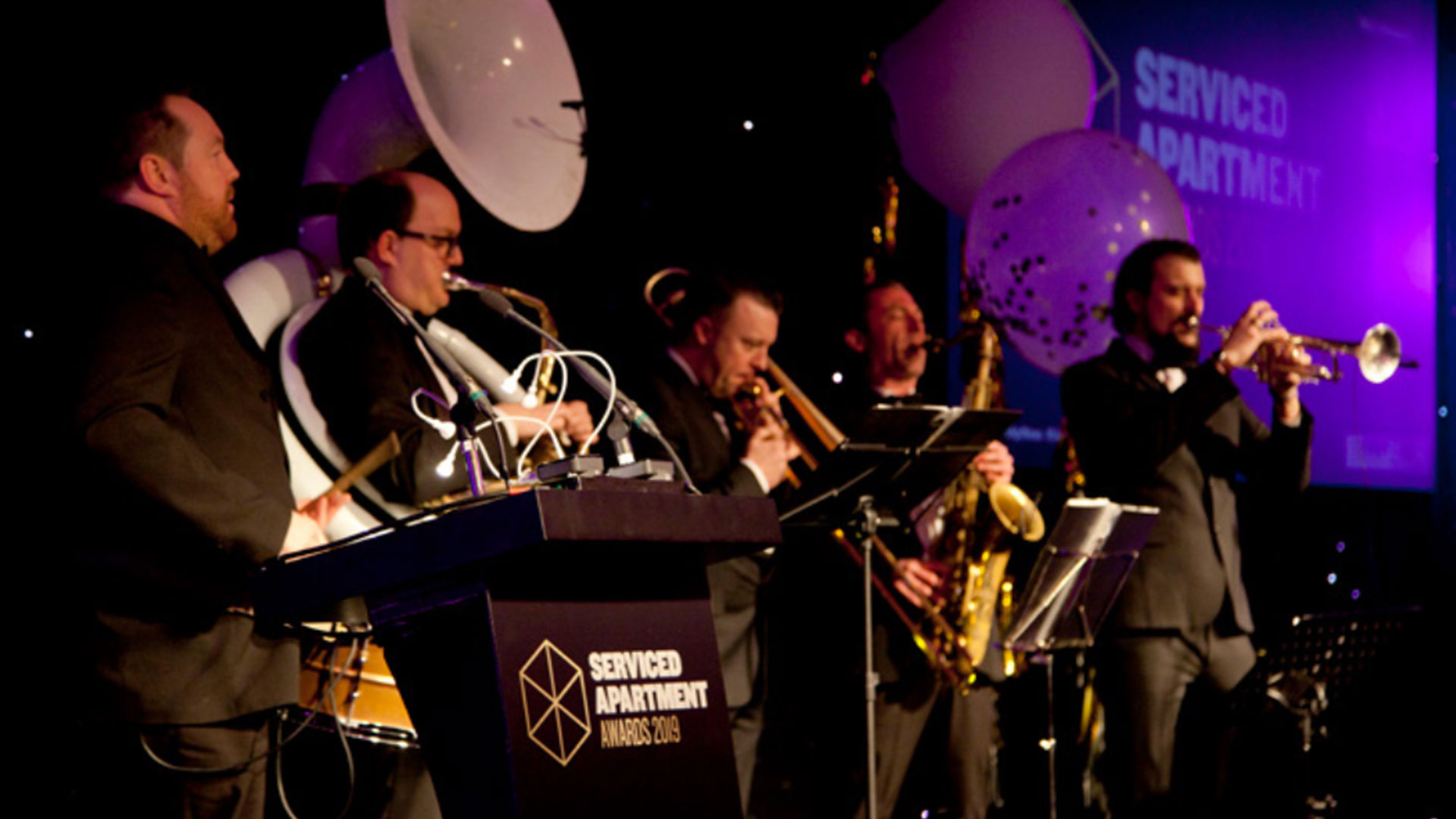 Band playing wind instruments at the Serviced Apartment Awards 2019.