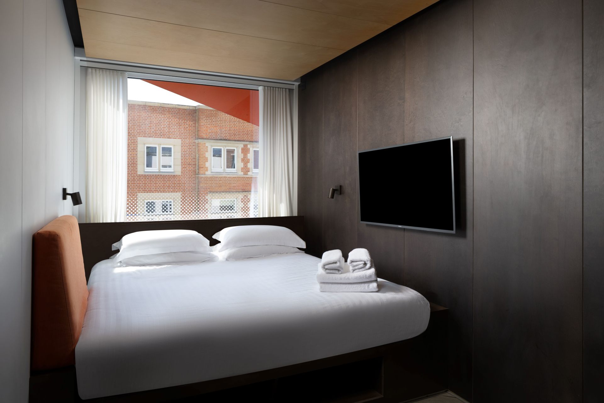 Super king-size bed in a Stow Away Waterloo studio apartment