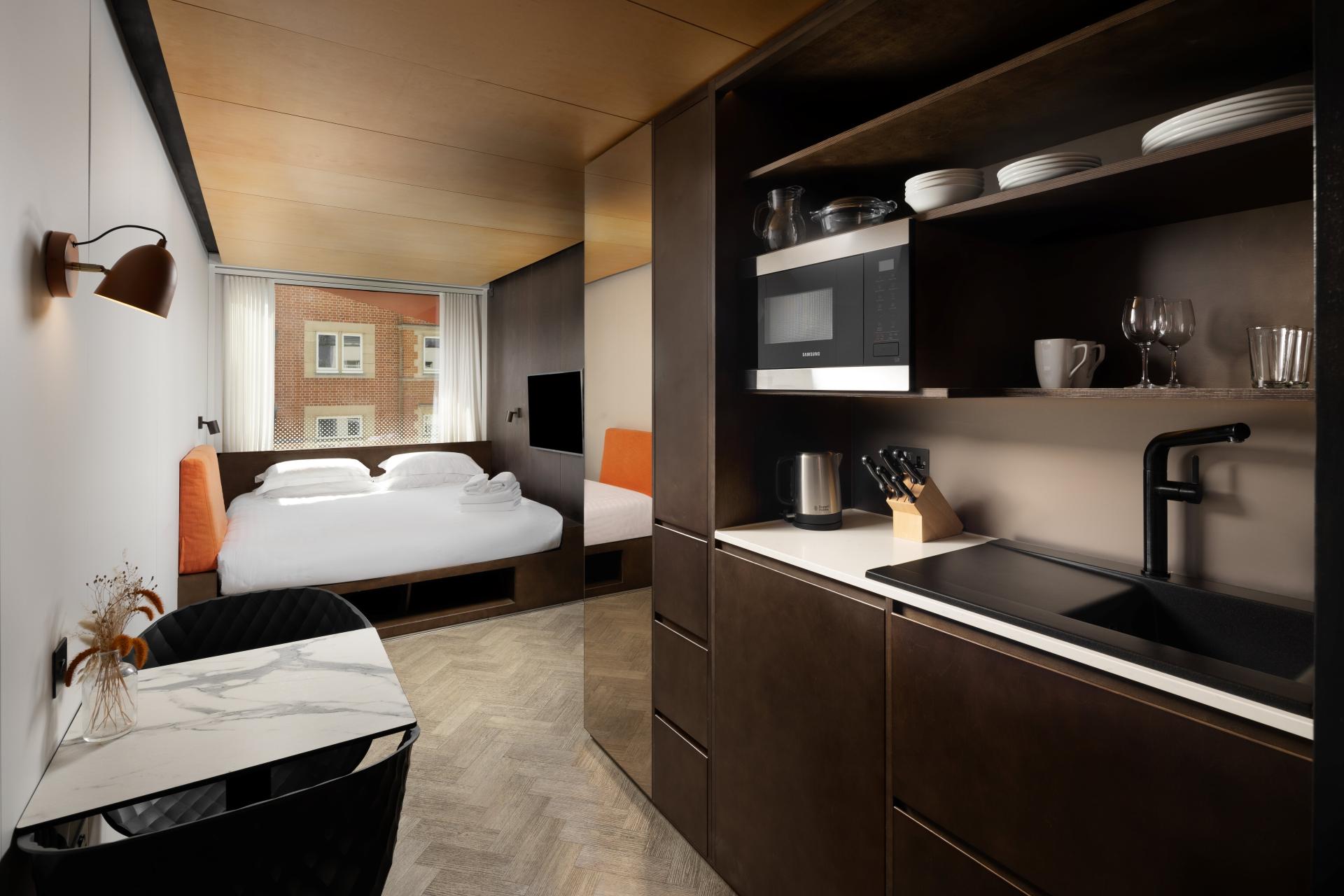 Bedroom area of a Stow Away Waterloo studio apartment