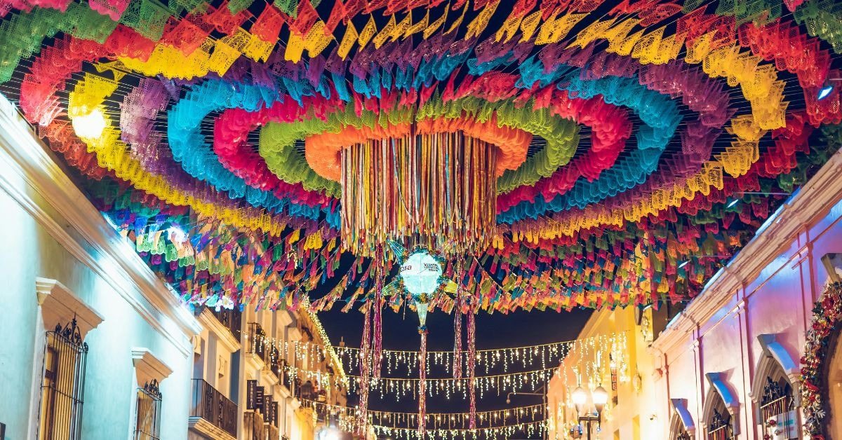 Colorful-street-decorations-during-a-vibrant-festival-night-in-Oaxaca-Mexico