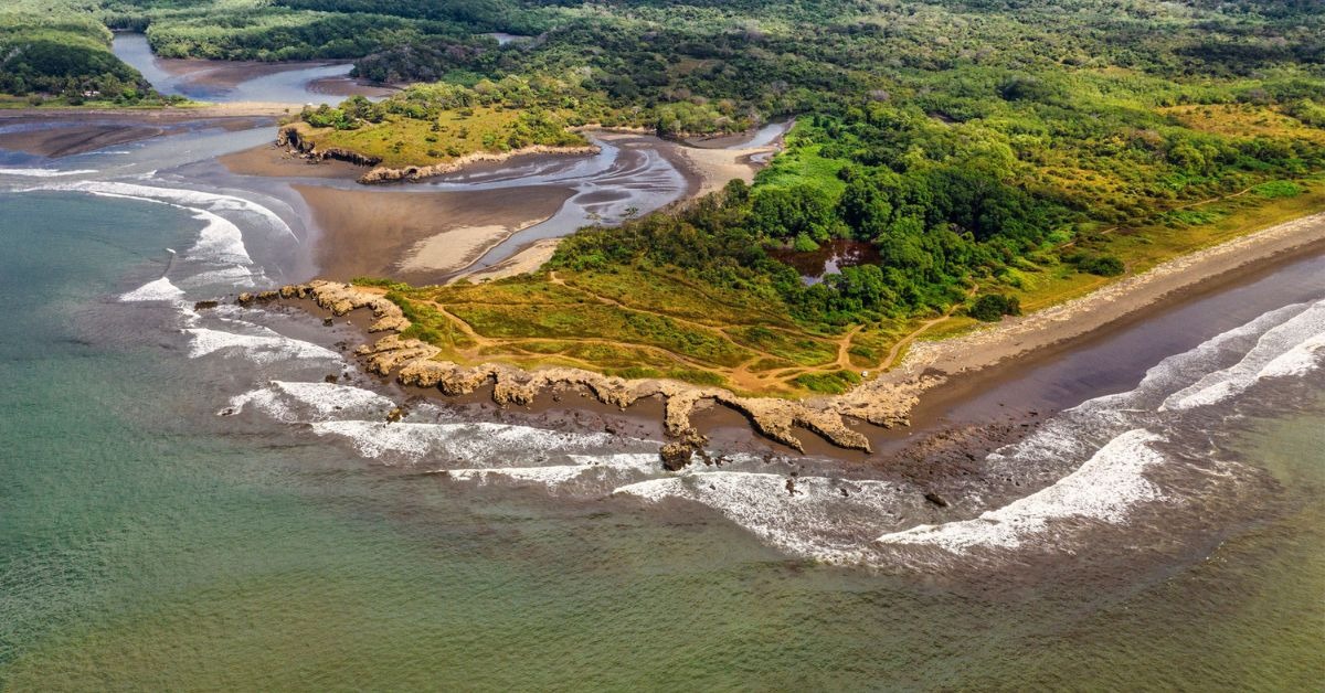 Stunning-aerial-shot-of-the-lush-coastline-in-Puntarenas-Costa-Rica