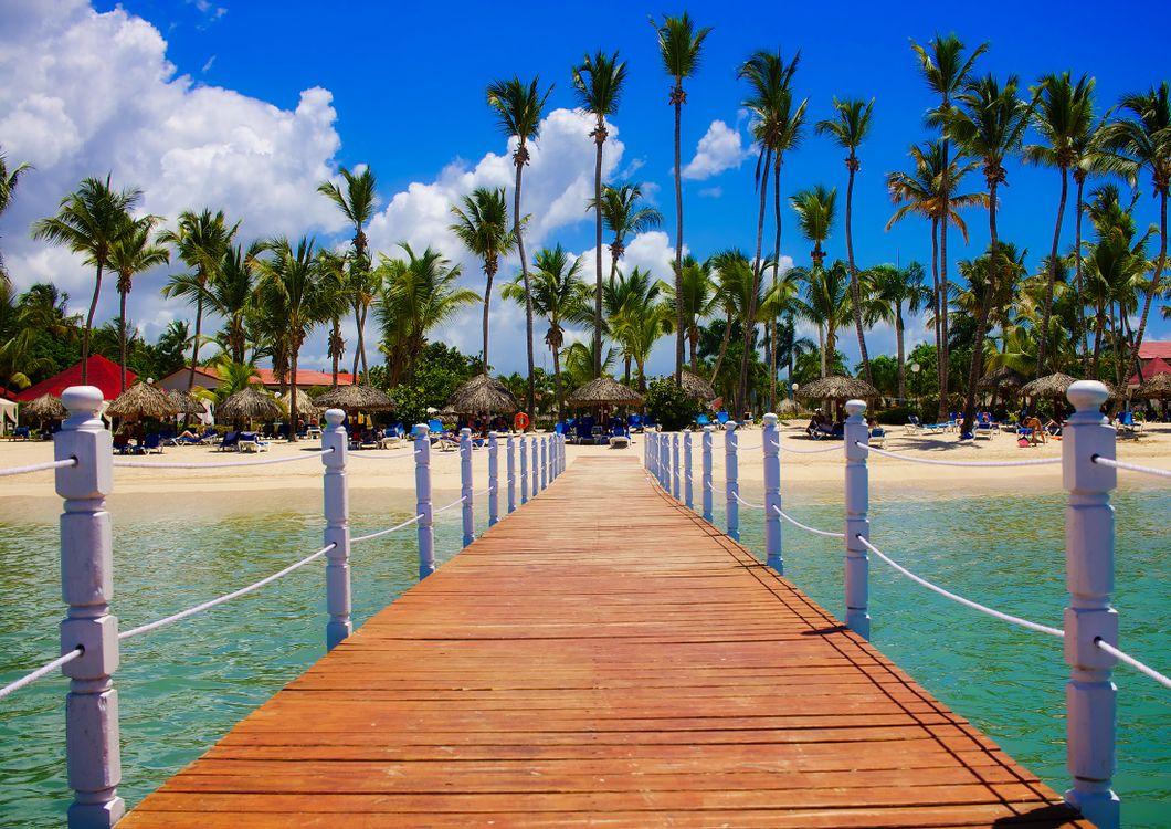 Dominican Republic beach, pier turquoise Caribbean water