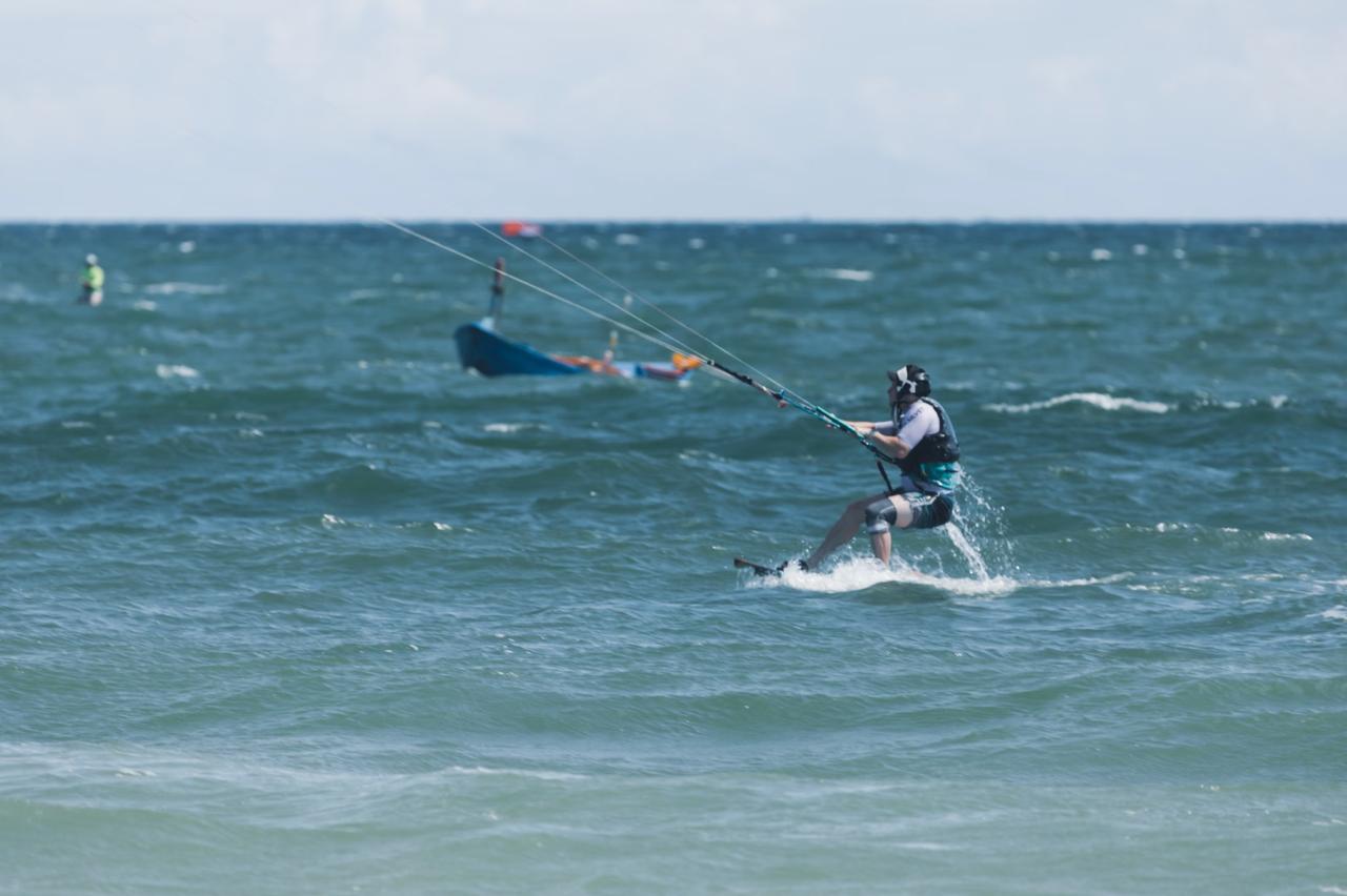 Kitesurfers riding the trade winds off Cabarete beach on the Dominican Republic north coast from October to March