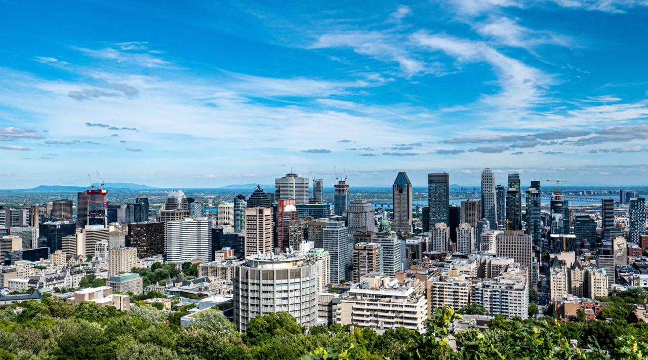 Panoramic view of downtown Montreal's skyline seen from the Kondiaronk Belvedere lookout on Mount Royal