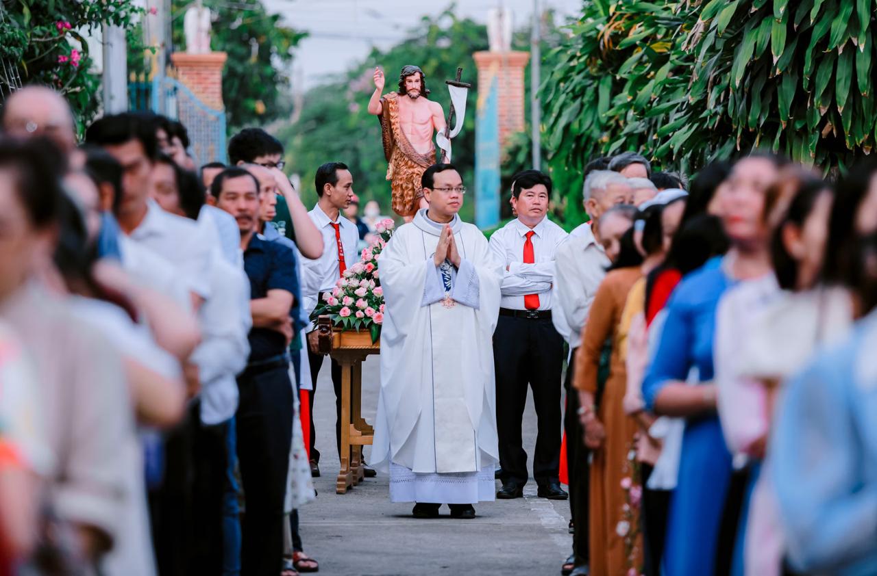 Catholic procession through a Dominican town street