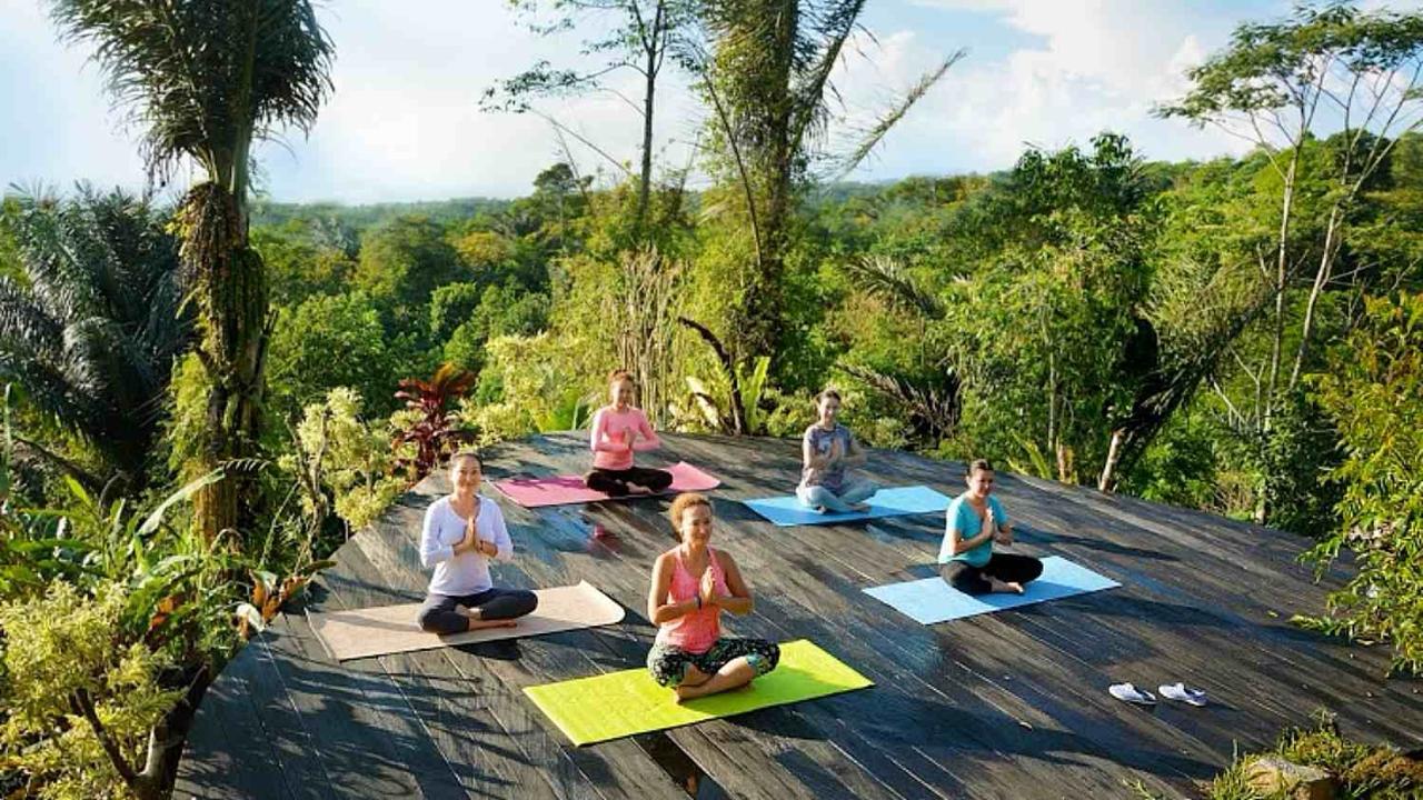 People doing yoga in Bali