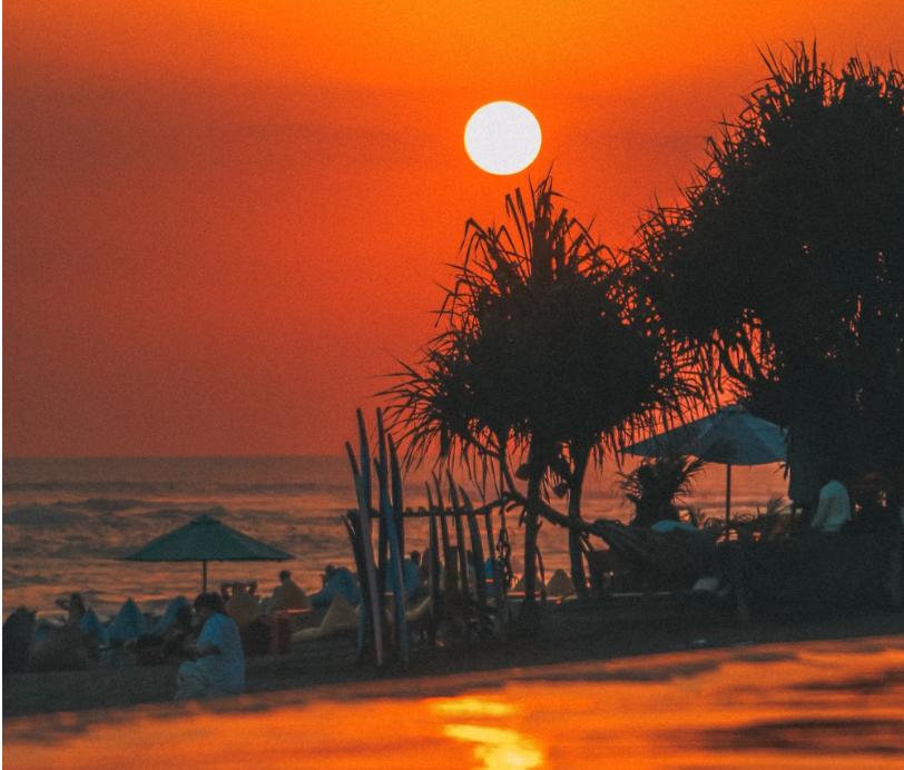 Bohemian La Brisa Beach Club sunset view in Canggu Bali with wooden decor