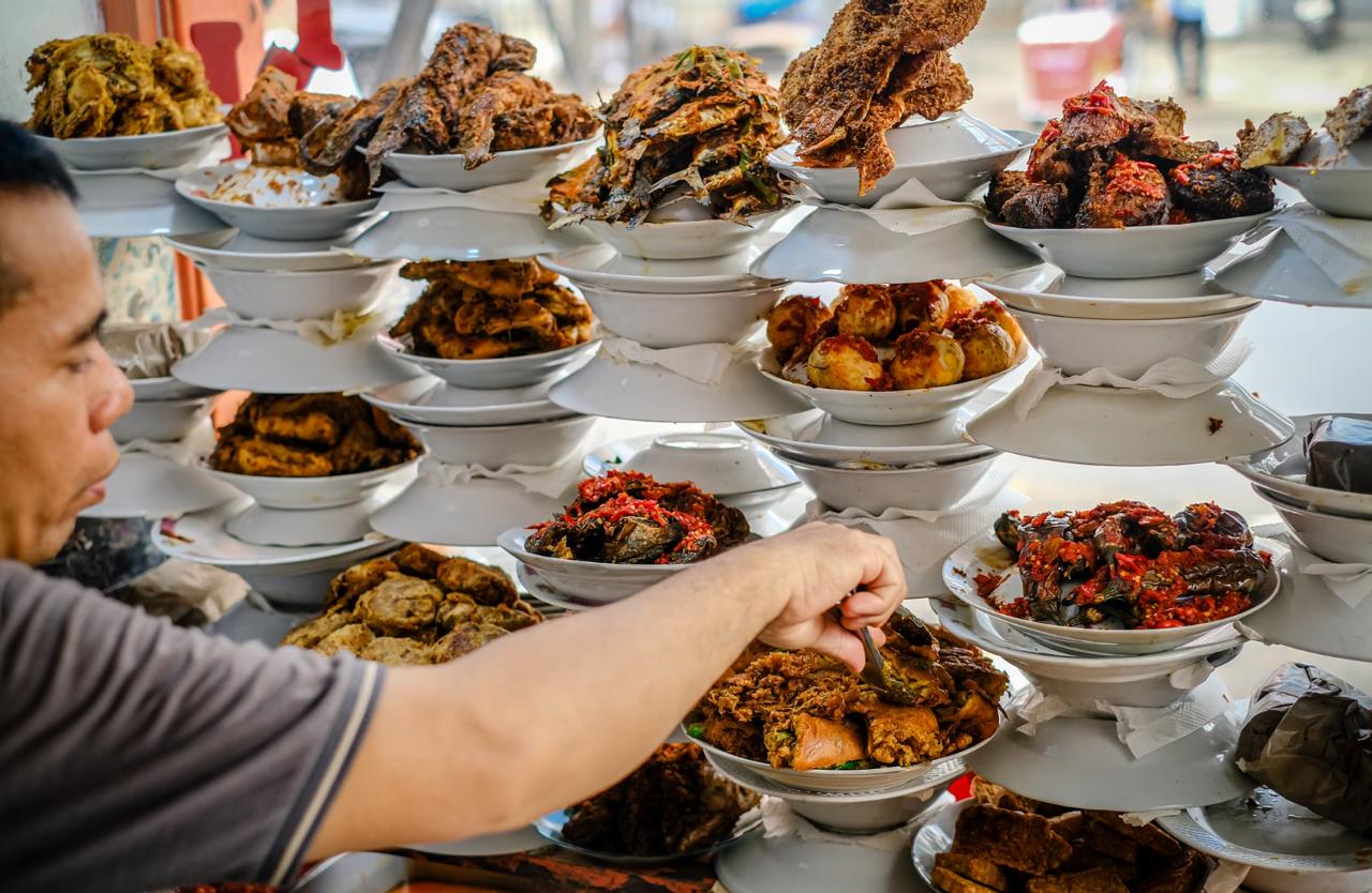 Food display counter at authentic local warung restaurant in Canggu Bali