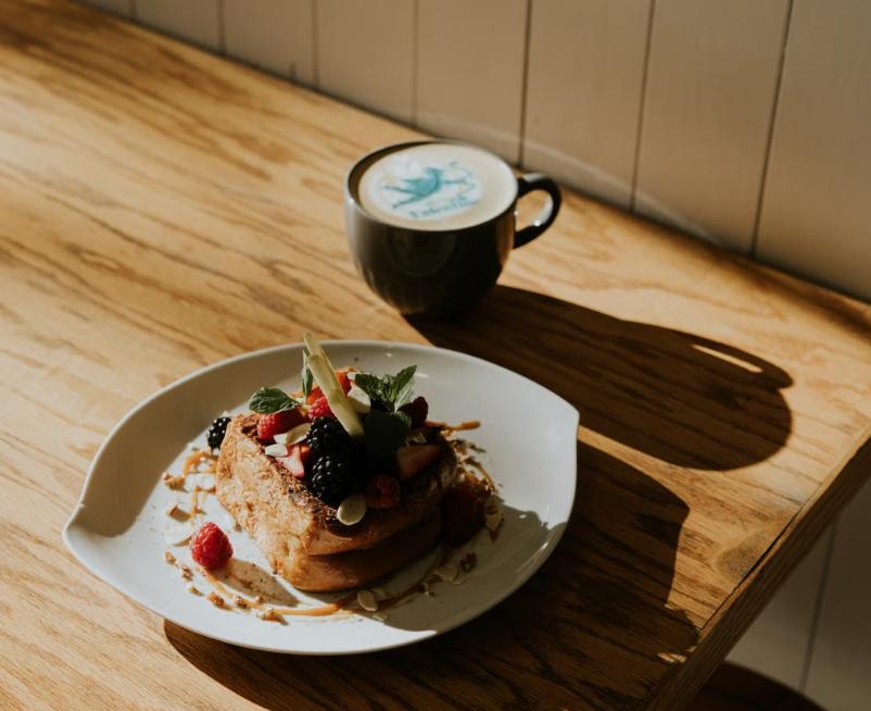 Overhead shot of French toast and coffee at Crate Cafe Canggu Bali