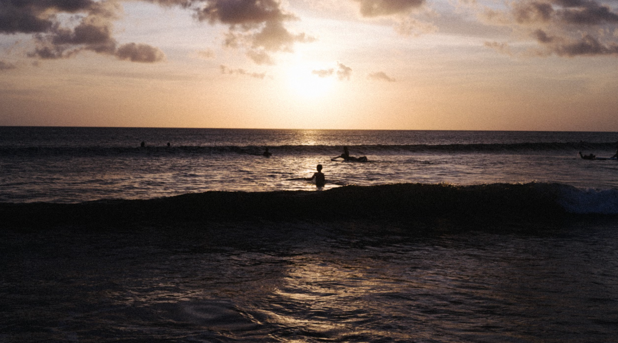 Sunset at Pererenan Beach in Canggu with travelers and vendors