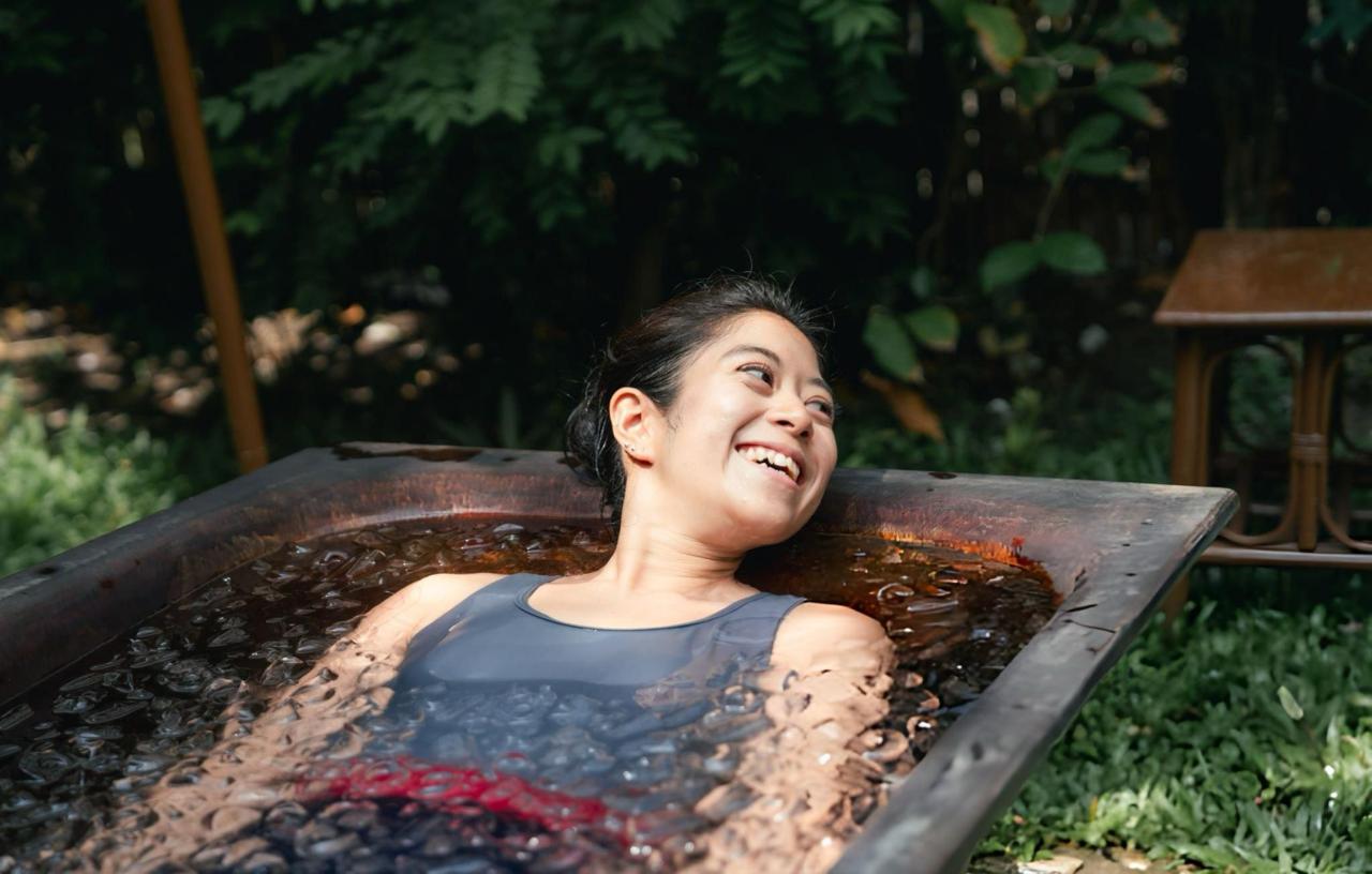 Women practicing necessary steps for ice bath therapy