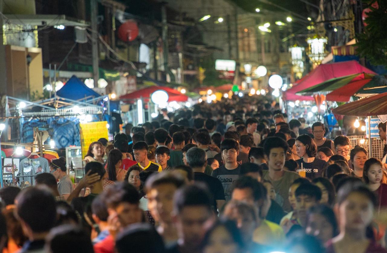 Busy Seminyak market with crowds and local vendors