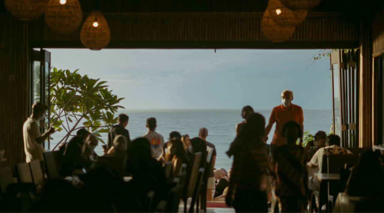 Ku De Ta restaurant with beachfront sunset dining and elegant plating