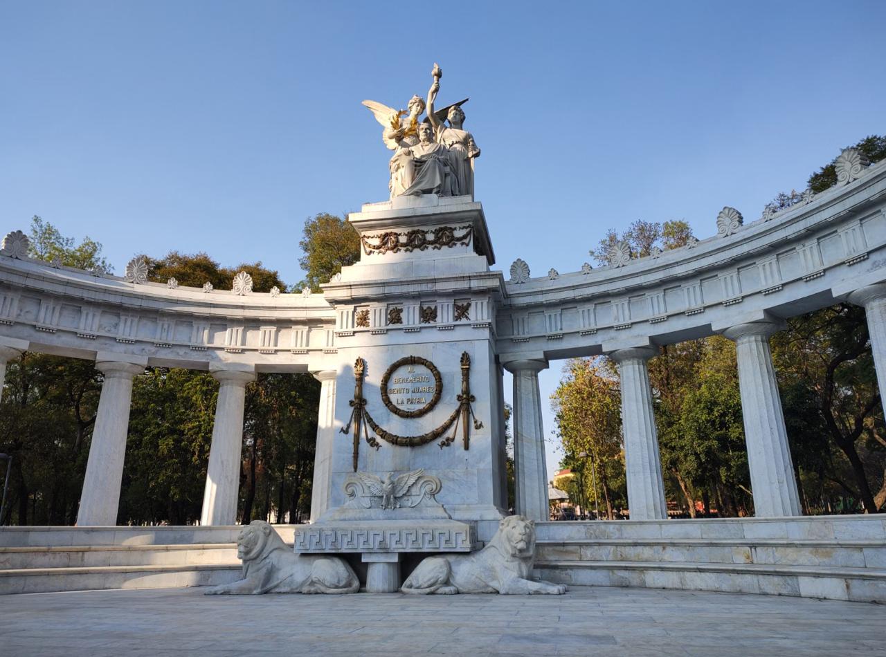 The white marble Memorial of Rebirth spire rising above Revolution Square in central Bucharest