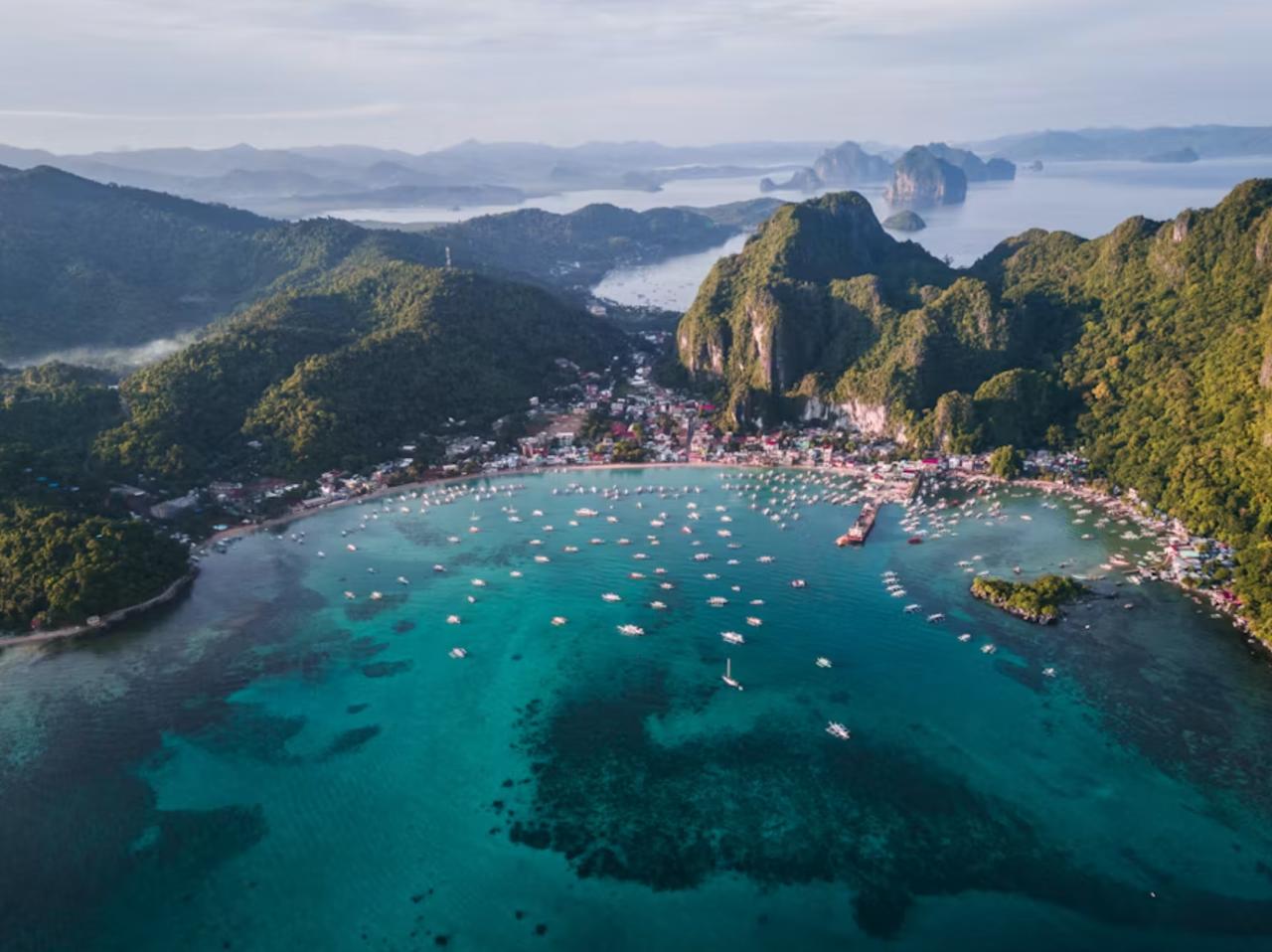 Phi Phi Islands surrounded by turquoise tropical ocean waters.
