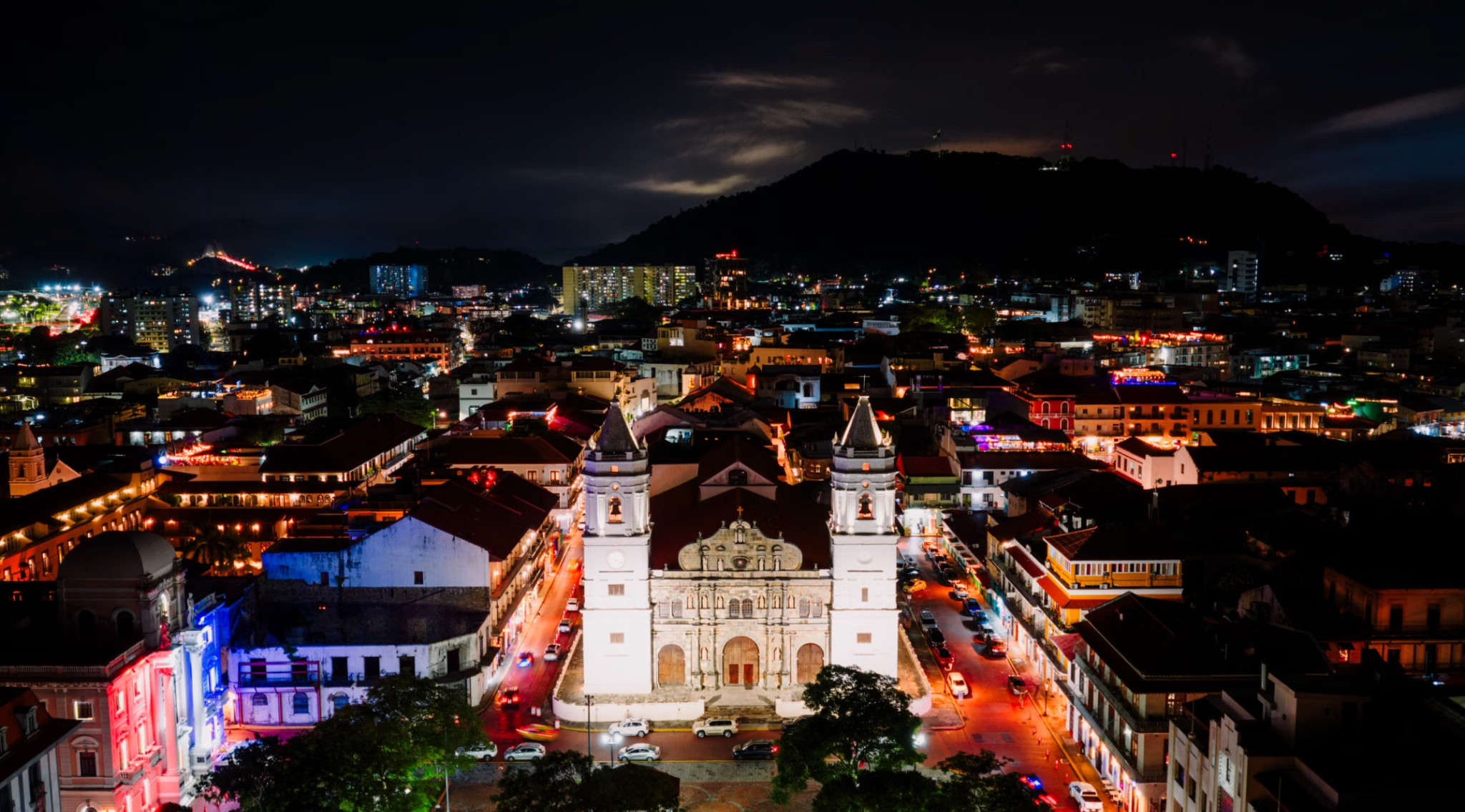 Illuminated Casco Viejo cathedral and old town at night