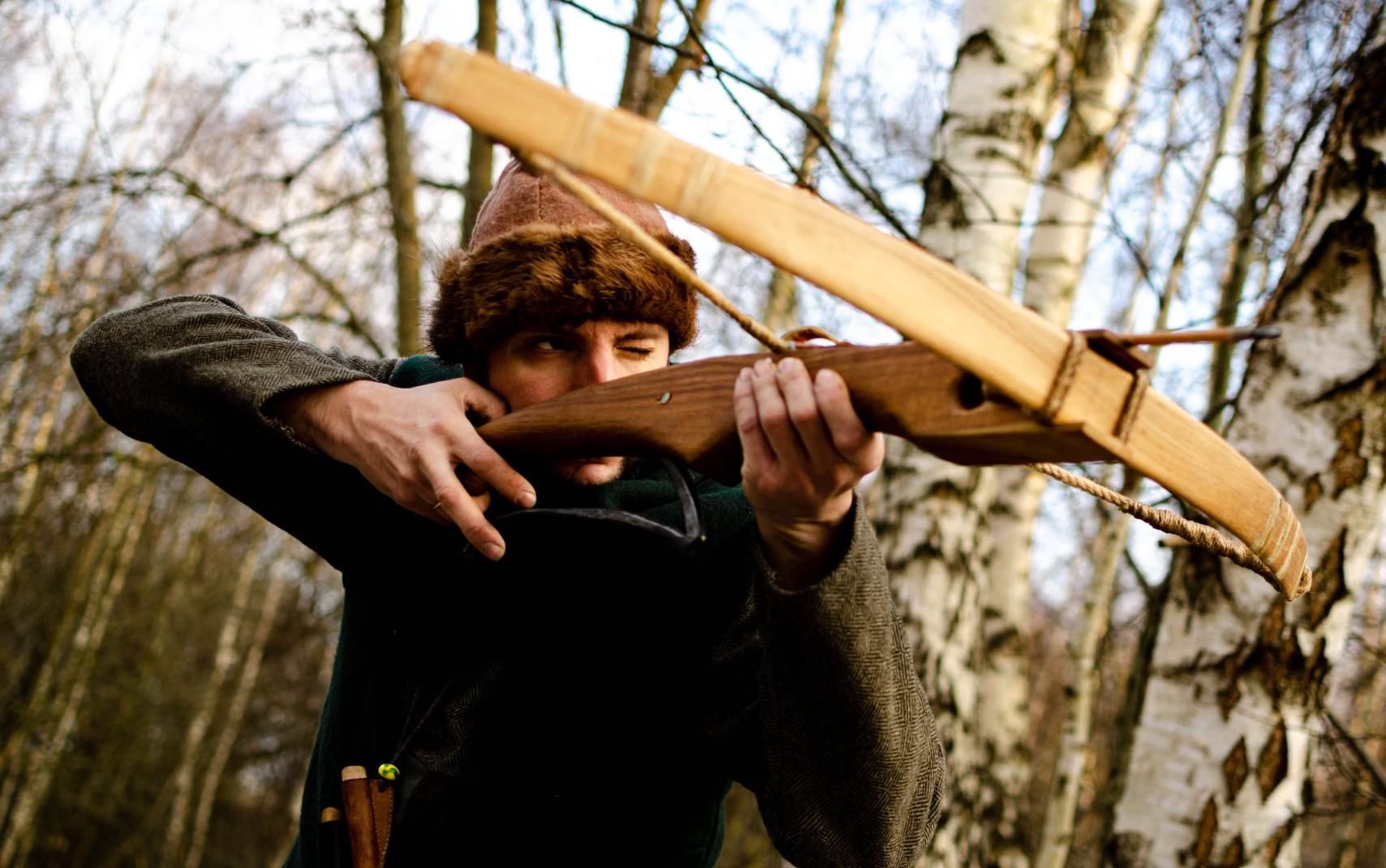 Traditional Crossbow Events in woods medieval crossbow in hand.