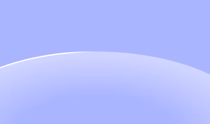 Smooth, curved translucent surface with a light reflection on a soft periwinkle blue background.
