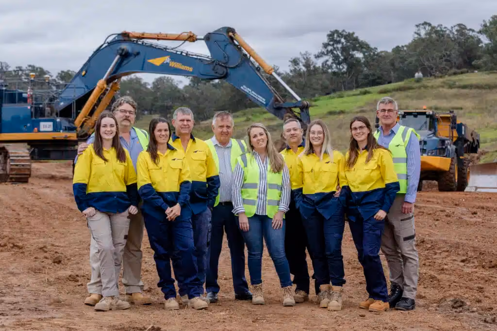 Group picture of JK Williams team on a civil construction site