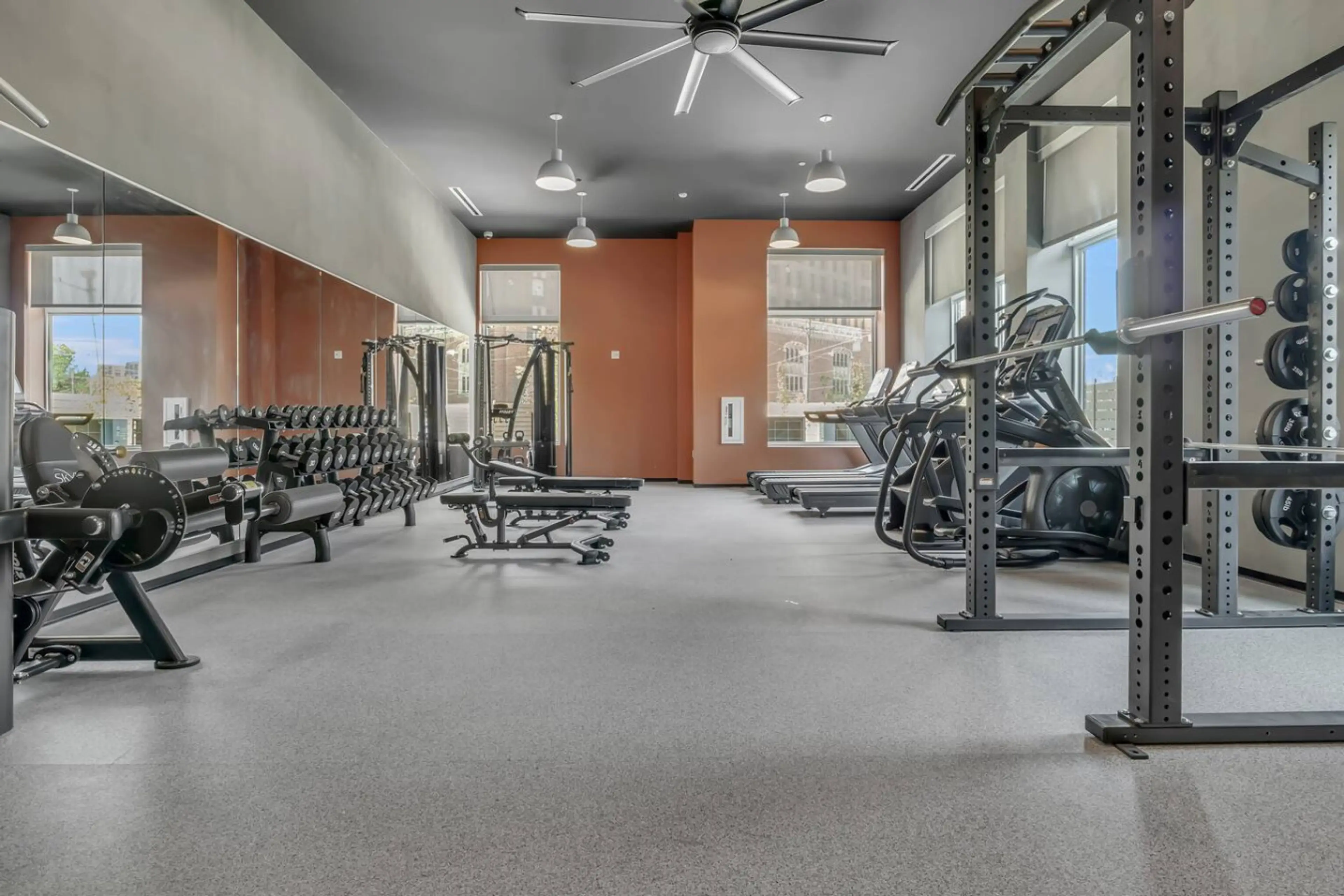 Fitness centre with free weights, racks and treadmills in a Nearwell building