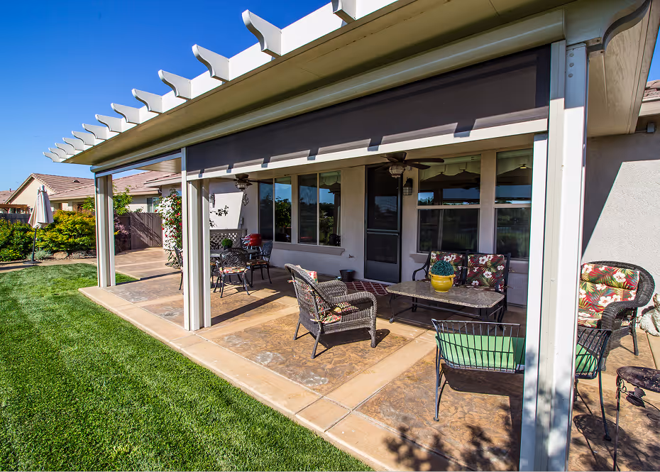 AZ Builders LLC specialized covered patio with outdoor seating, table.