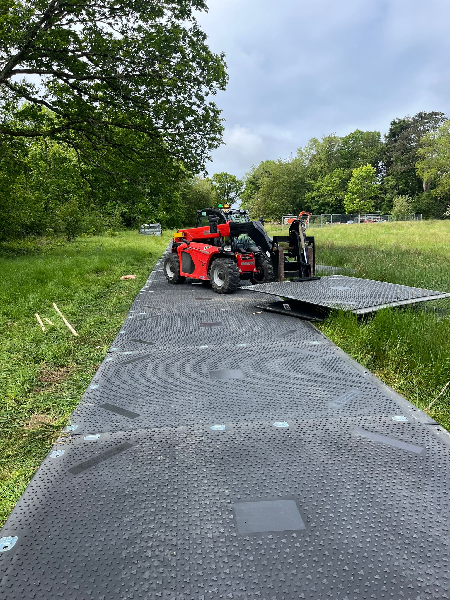 ground protection panels and trackway being laid