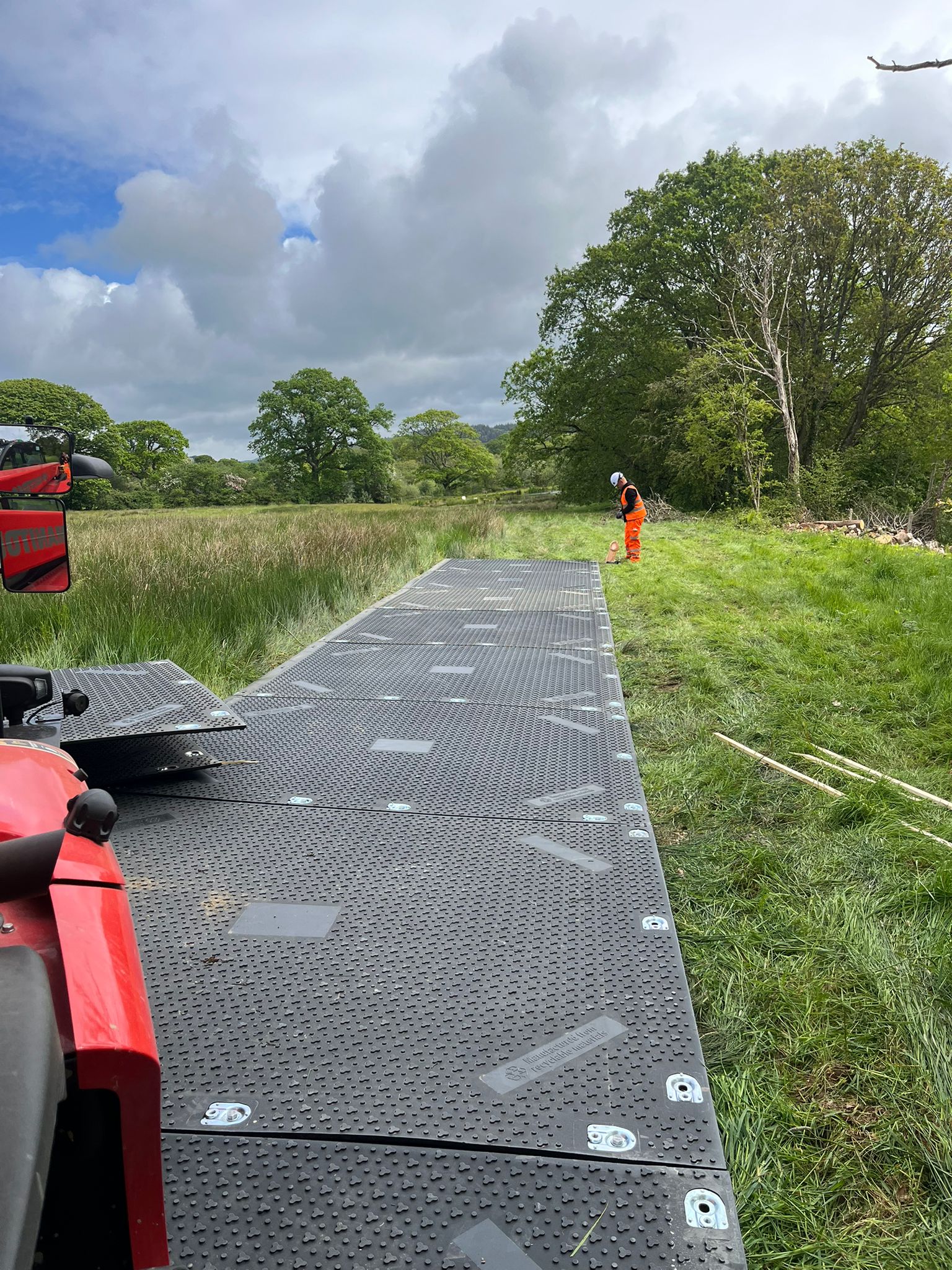 ground protection panels and trackway being laid