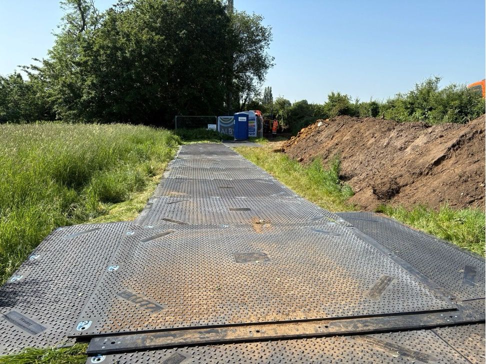 Heavy-duty mats access road construction