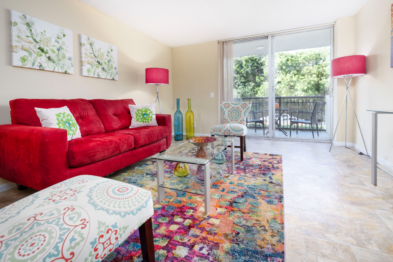 Living area with sofa and balcony doors