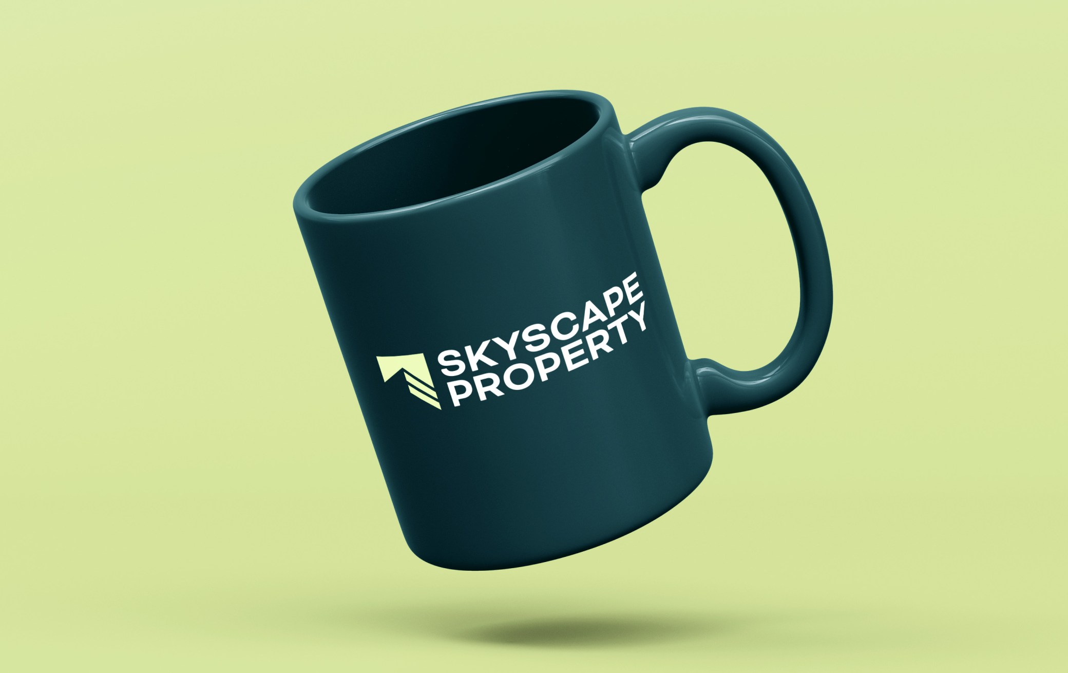 Branded merchandise mockups demonstrating how the Skyscape Property identity adapts across clothing and promotional items.