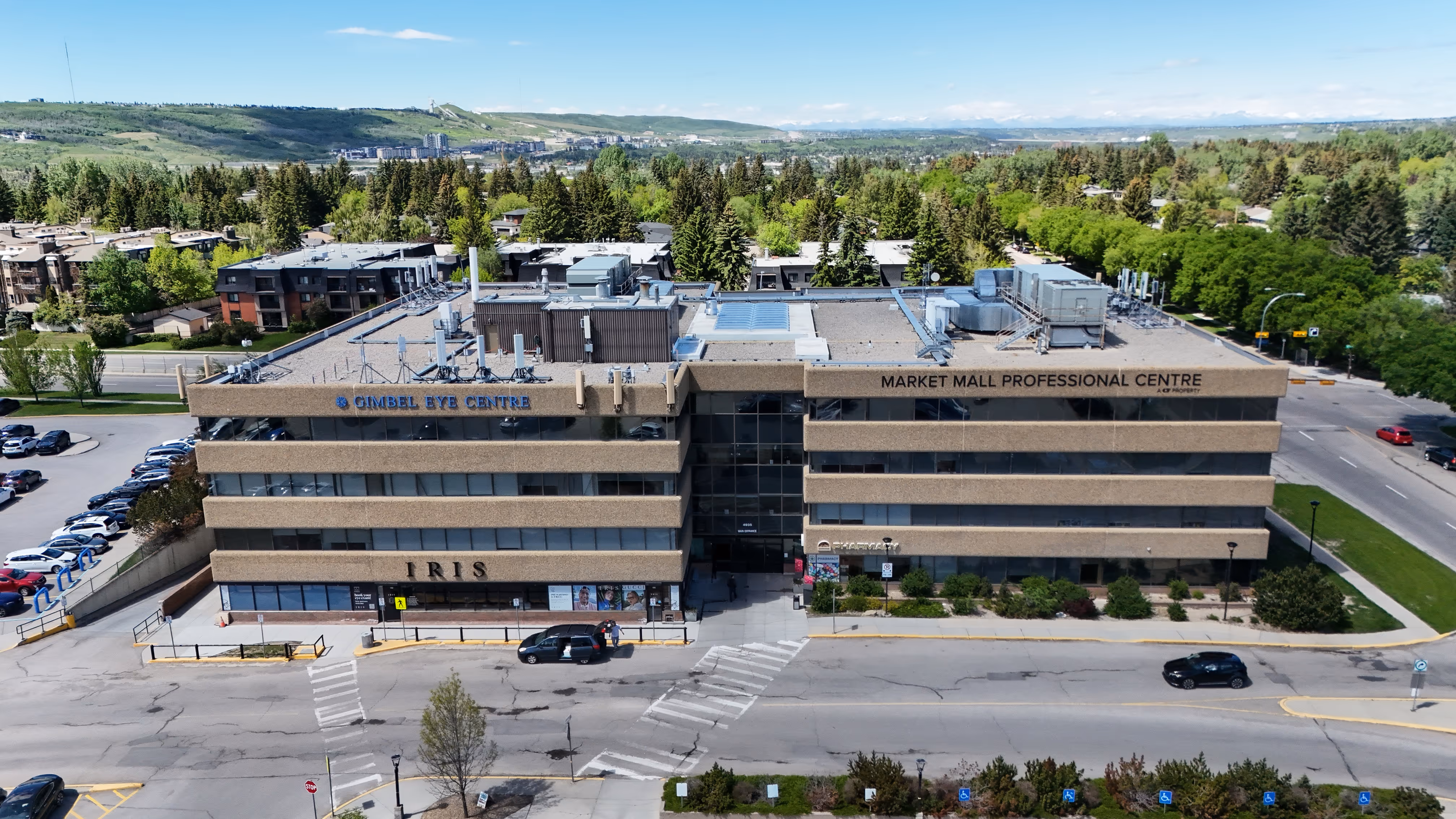 Aerial summer view of the Steve Bureau Oral & Maxillofacial Surgery clinic building surrounded by greenery
