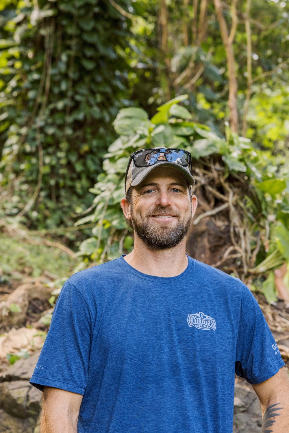 Michael Hunsaker, Director of Operations at Outfitters Kauai, in front of jungle vines