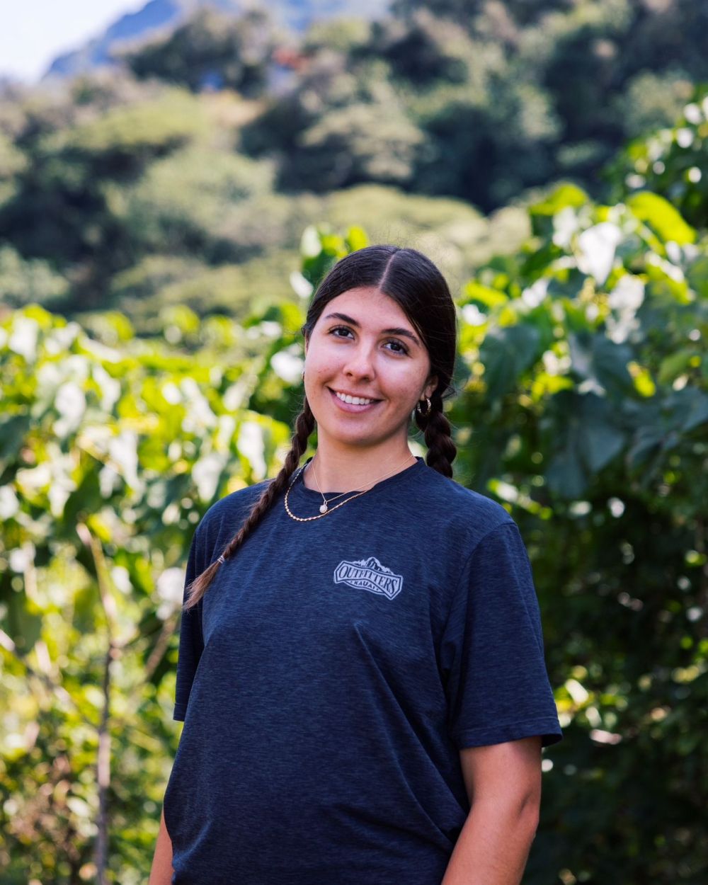 Outfitters Kauai guide smiling in the greenery at Kīpū Ranch