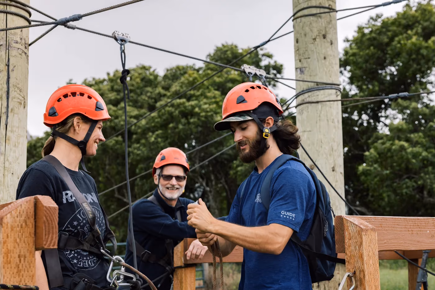 Zipline participants receiving safety briefing before Kauai canopy tour activity begins