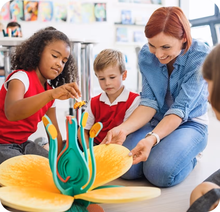 school students and teacher playing
