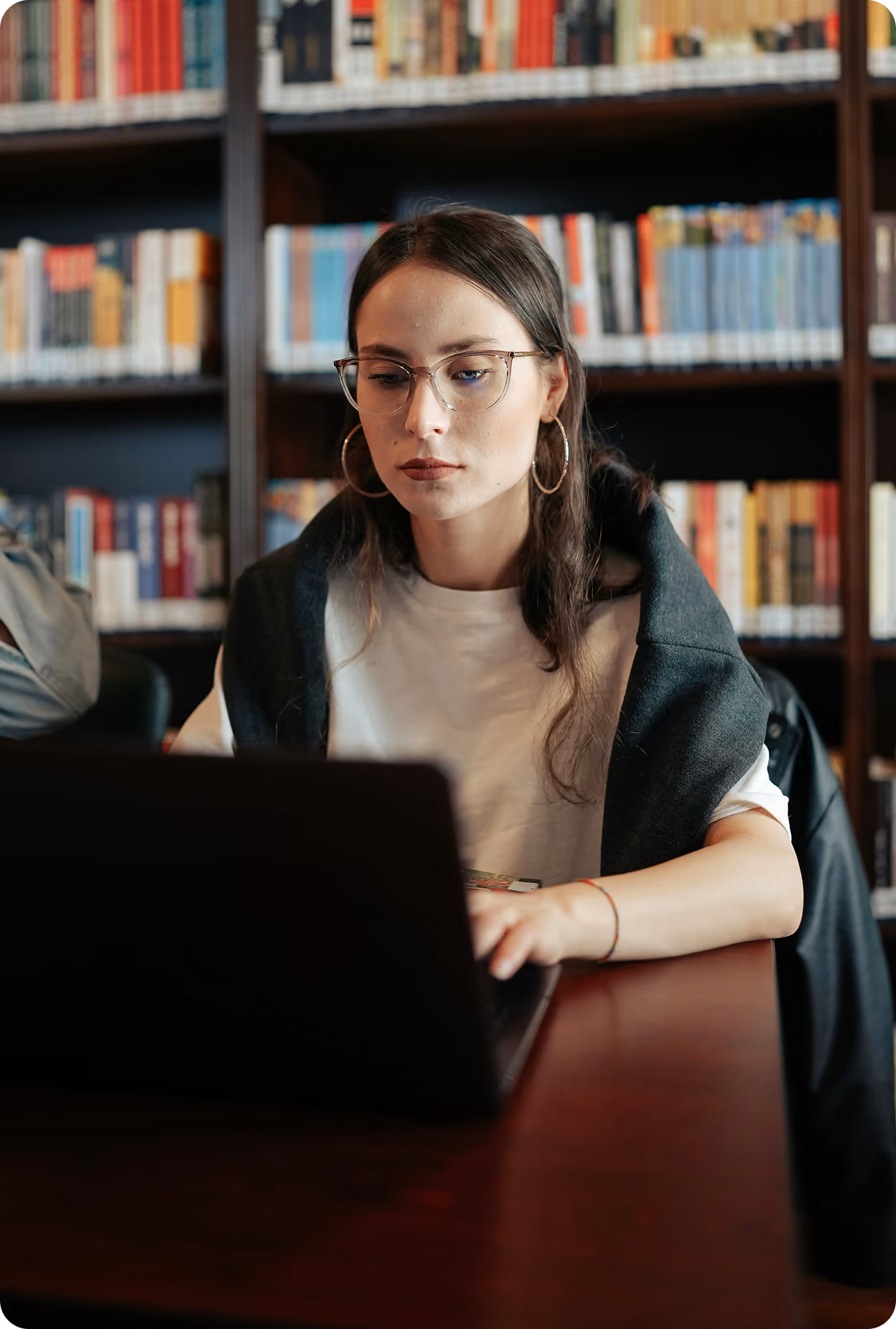 Student researching on library
