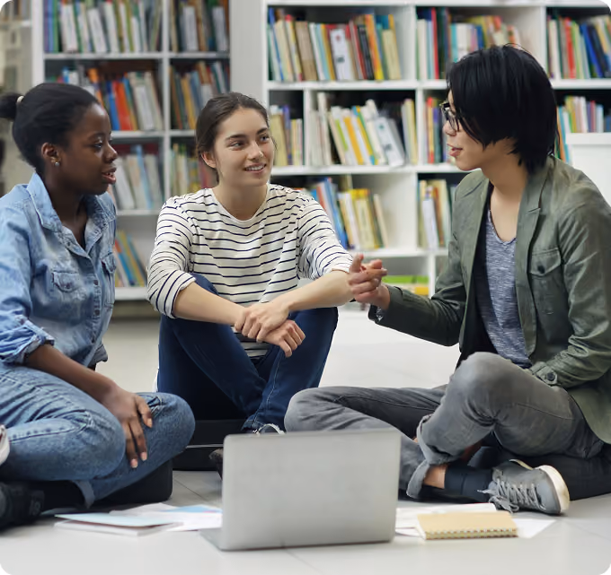 few student gossiping with smile