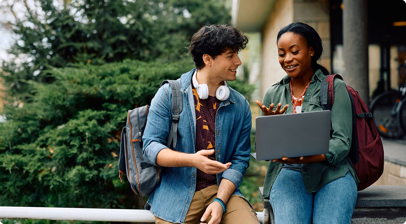 Two students gossiping with smile