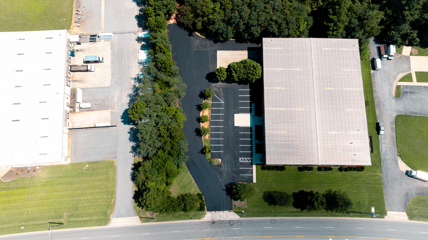 Aerial view of the completed Gexpro Services parking lot project in High Point, NC, adjacent to the main entrance